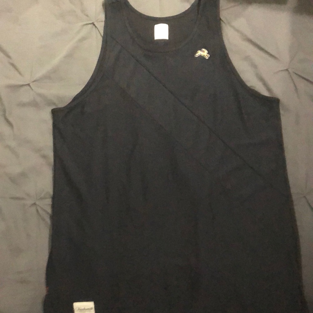 Tracksmith Van Cordtland black-on-black singlet